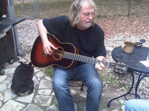 Ray Wylie Hubbard and bored dog
