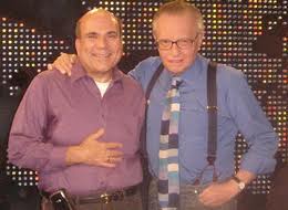 Oops. No beads on Larry King.