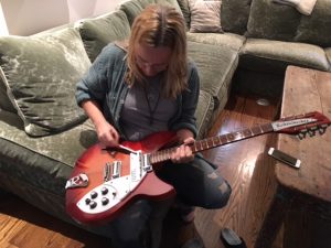 Melissa showing me her rare Rickenbaker "Cadillac", an electric 12-string that can be turned into a 6-string with an awkward device