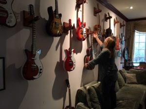 Melissa Etheridge showing me some of her guitars in her home